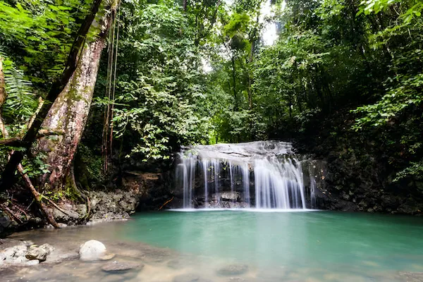 The biggest waterfall of the seven in the nature park Los Siete Altares in the middle of the jungle of Livingston