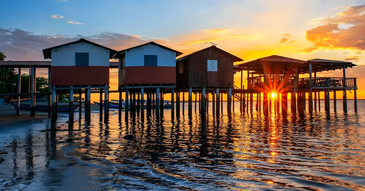 Small houses built in a wooden dock in the island La Pirraya in Jiquilisco Bay of El Salvador
