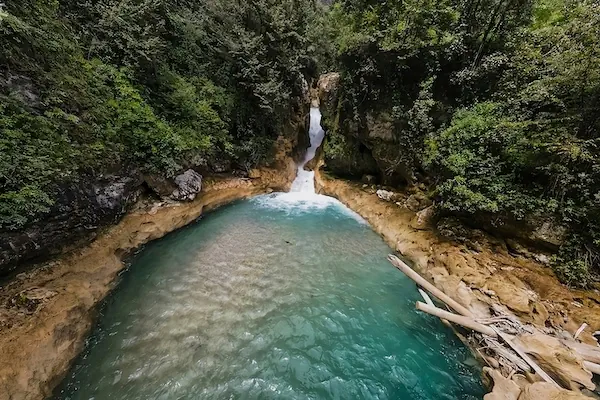 The Encantada Lagoon in the middle of the river Quisil in the forest of Huehuetenango